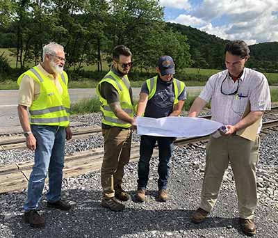  Left to Right- Jeff Stover, Executive Director (SEDA-COG Joint Rail Authority), Kyle Postupack, Principal Program Analyst (SEDA-COG JRA), Zac Mahaffey, Director of Maintenance and Way (SEDA-COG JRA) and Tom Levine, President (Levine Engineering).